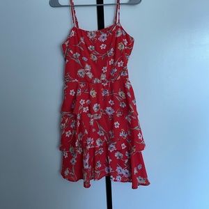 Reddish orange size M ruffle mini dress.